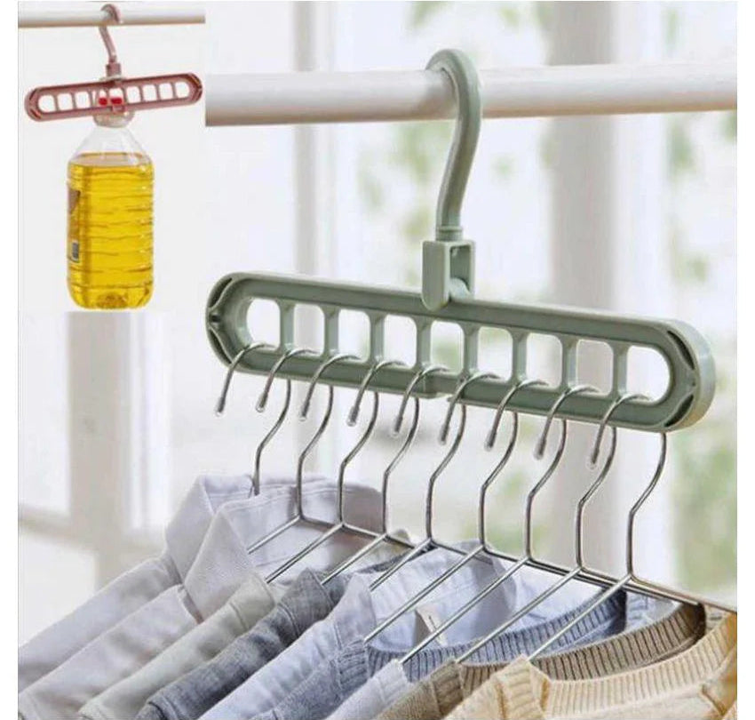Multi-layered hanger with clothes on a blurred indoor background